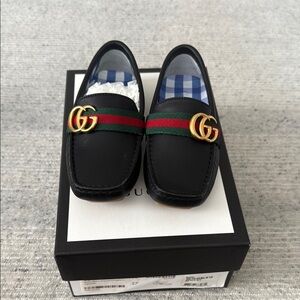 Gucci Black and Gold Dress Shoes with Signature Design
